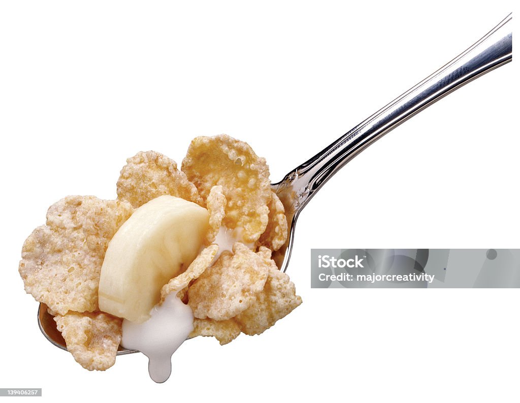Colher de cereais com fatia de banana - Foto de stock de Alimentação Saudável royalty-free
