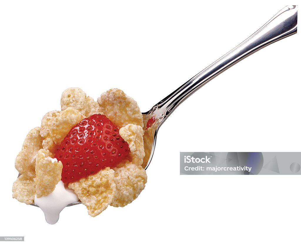 Cucchiaio di cereali con fragole - Foto stock royalty-free di Alimentazione sana