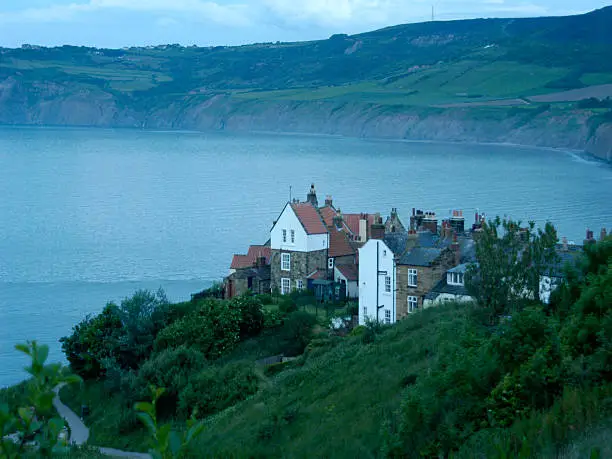 A view of historical Robin Hoods Bay at sunset
