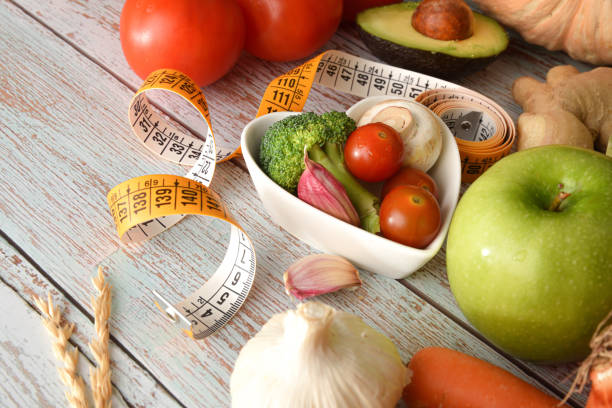 istock Healthy eating weight control vegetables in heart shaped container elevated 1394063820