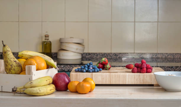 istock Fresh fruit in the kitchen on a wooden table 1394064074