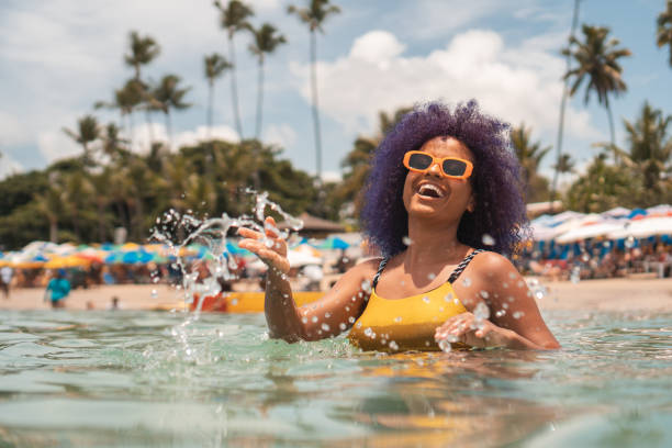 Woman having fun at Porto de Galinhas beach