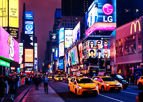 Times Square taxi traffic by night, New York City, USA