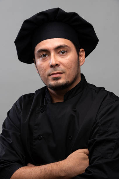 istock Hispanic chef posing looking at the camera 1394078346