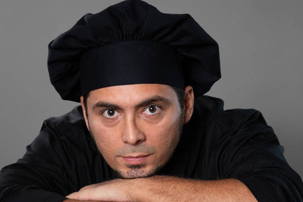 istock Hispanic chef posing looking at the camera 1394079058