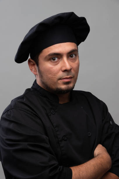 istock Hispanic chef posing looking at the camera 1394079061