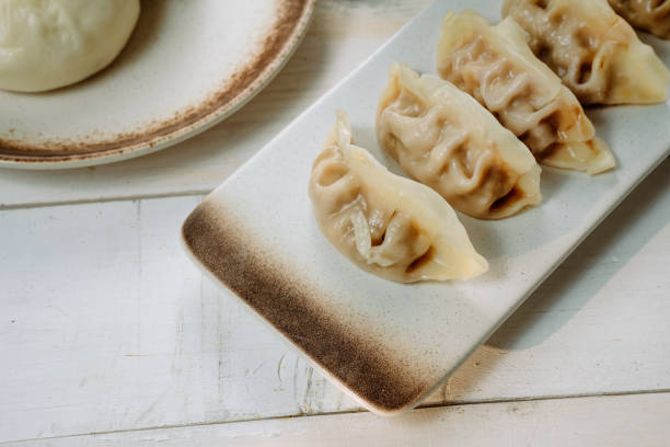 istock Dumplings, steamed stuffed buns, soybean milk 1394092262