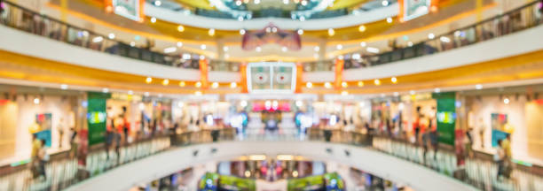 Abstract blur modern shopping mall interior background stock photo