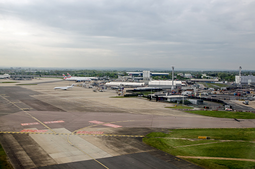 London, UK - April 19, 2022:  Aerial view of Heathrow Airport in London with the Royal Suite building towards the right hand side.  The small building is used for VIP travellers and offers high quality food and a butler service.