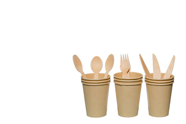 Paper cup and cutlery isolated.