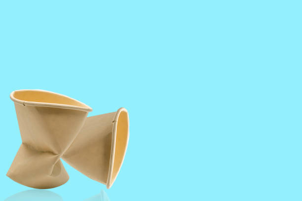 istock Crumpled used of brown paper cup. 1394105552