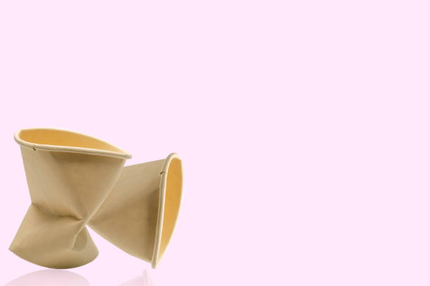 istock Crumpled used of brown paper cup. 1394105555