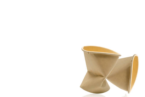 istock Crumpled of paper cup isolated. 1394105559
