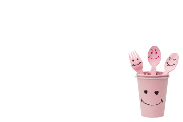 Happy paper drinking cups, and cutlery wooden on white background. Ideal wallpaper , background , banner ect.,  Environmental  friendly Concept.
