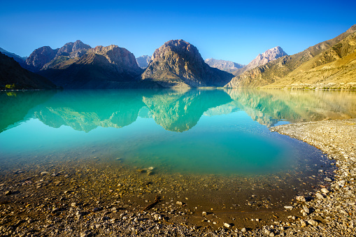 Scenic view of Iskanderkul - an alpine lake in the mountains of Tajikistan
