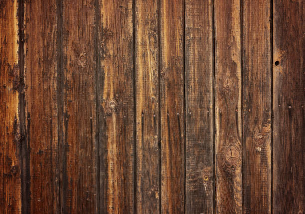 istock old dark wood board background 1394110035