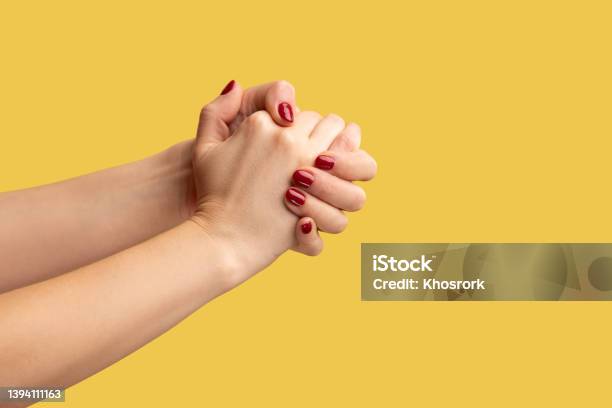 Closeup Side View Of Right And Left Woman Palms Are Connected In Lock Support And Togetherness Stock Photo - Download Image Now