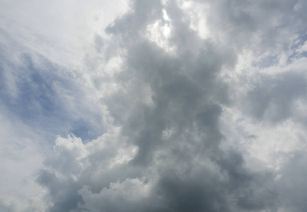 Cumulonimbus cloud formations on tropical sky , Nimbus moving , Abstract background from natural phenomenon and gray clouds hunk , Thailand