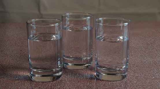 Filled water in three glass on the table