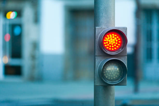 Red traffic light for pedestrians, close-up. stock photo