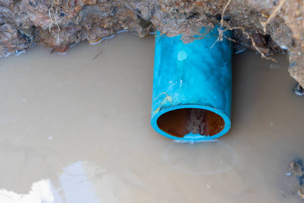 istock plumbing broken plastic pipe in the hole and water in wait repair 1394118335