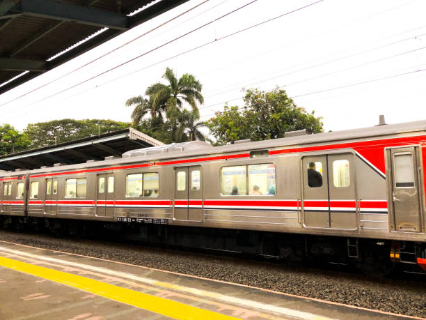 Jakarta, Indonesia - April 21, 2022. Commuter Line (KRL) arrived at Tebet railway station. Jakarta, Indonesia - April 21, 2022. Commuter Line (KRL) from Jakarta to Bogor arrived in Tebet railway station, Jakarta. tangerang photos stock pictures, royalty-free photos & images