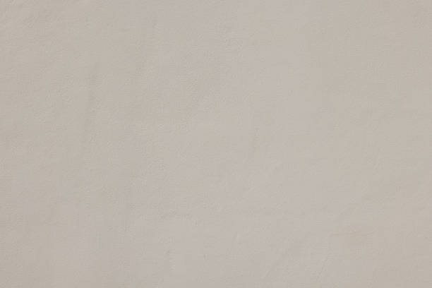 istock Part of a textured beige concrete wall 1394121465