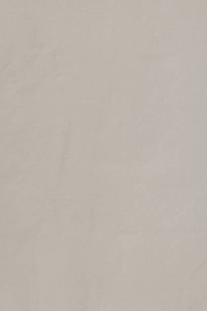 istock Part of a textured beige concrete wall 1394121469
