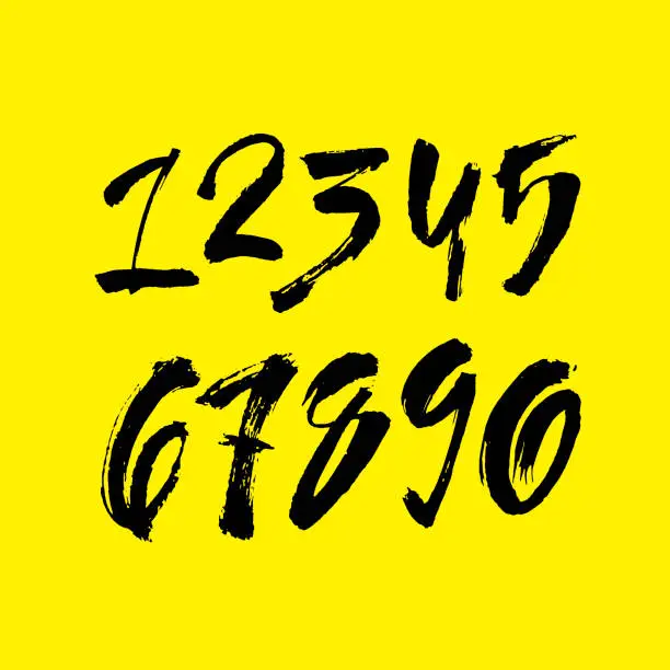 Vector illustration of set of calligraphic acrylic or ink numbers. ABC for your design, brush lettering on a yellow background