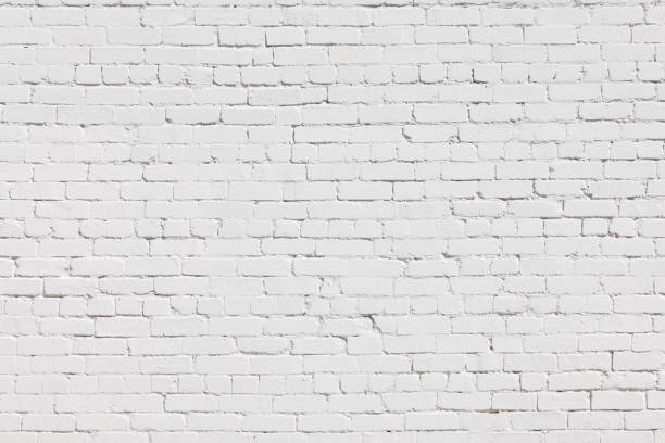 istock Part of an old white brick wall 1394125568