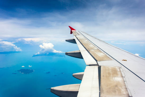 istock View from airplane window to see sky on evening time 1394126825