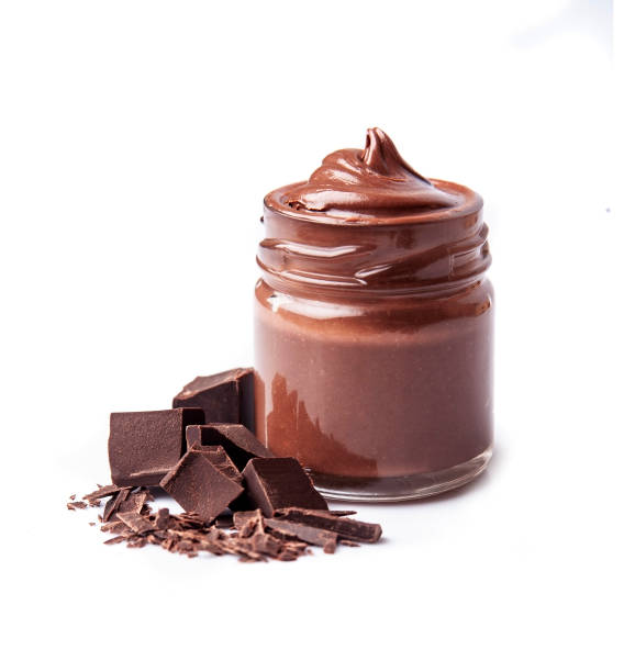 Chocolate splash with chocolate chips stock photo