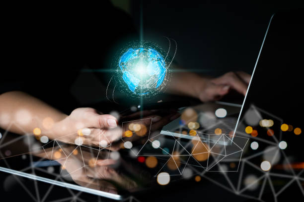 istock A businesswoman's hand is grasping a worldwide network, Global company, internet network connection, IoT (Internet of Things), and the notion of business intelligence. 1394128382