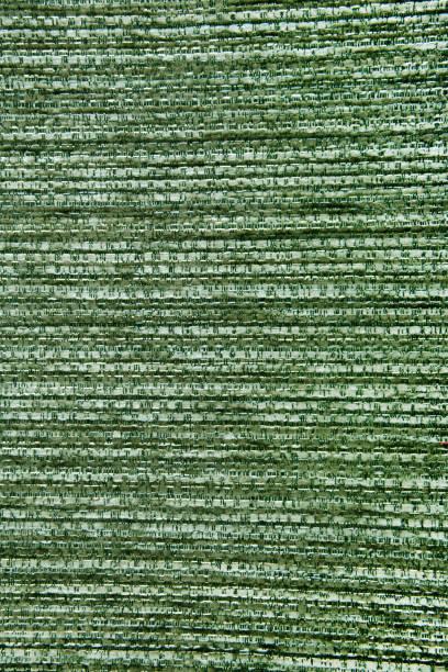 close up of the green  fabric upholstery material textured background - burlap canvas home decorating color image imagens e fotografias de stock