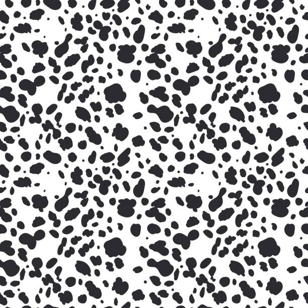 Dalmatian seamless pattern. Animal skin print. Dog and cow black dots on white background. Vector Dalmatian seamless pattern. Animal skin print. Dog and cow black dots on white background. Vector illustration stained textures stock illustrations