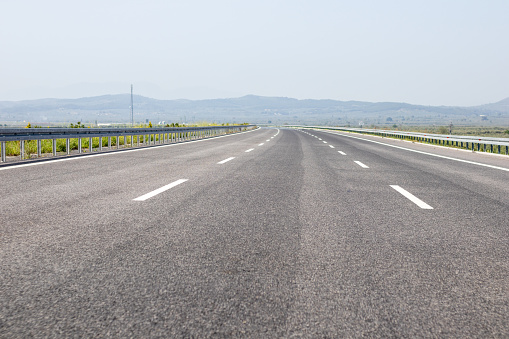 Double white lines on asphalt road background