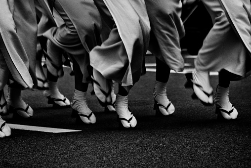 Image of foot movement of a woman dancing Awa Odori ,Monochrome