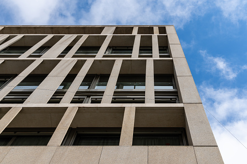 Madrid, Spain - October 10, 2021: Low angle view of luxury modern apartment building in Gran Via area