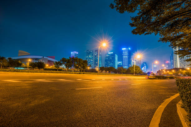 istock Empty asphalt road through modern city in Shenzhen, China 1394133906