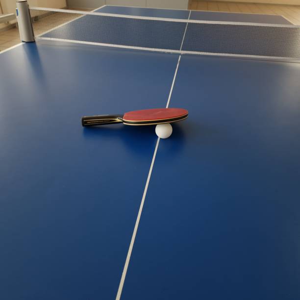 istock racket and tennis ball lie on the table 1394133954