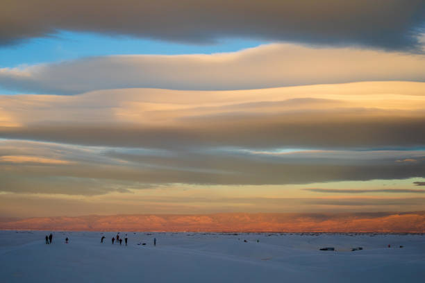 Rippling Sand Dune Stands Untouched At Sunset in White Sands National Park