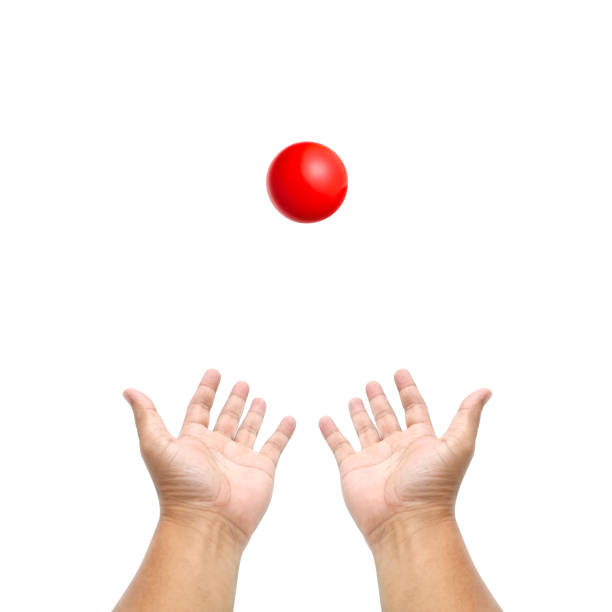 istock Hand holding snooker ball on white background 1394141213