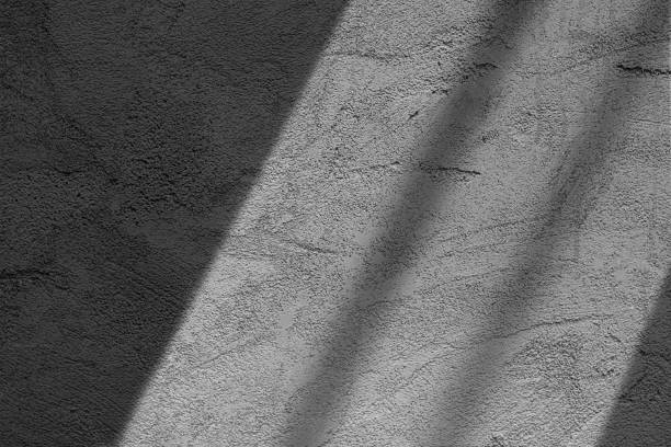 istock light and shadow concept on gray cement floor 1394144560