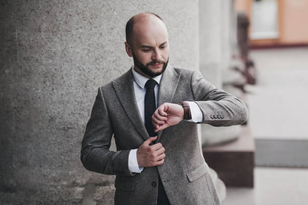istock Handsome bearded businessman in classic suit 1394144656