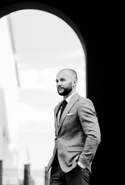 istock Handsome male model in suit 1394144659