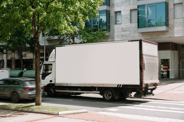 istock Semi truck in a city 1394144962