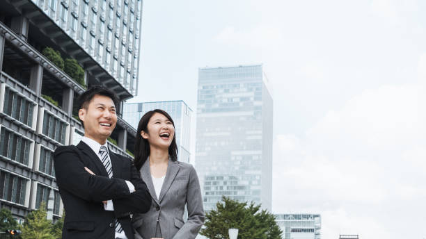 istock Image of men and women doing business 1394145540