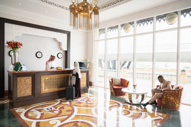 istock Riyadh hotel guests and staff in sunny reception area 1394149731