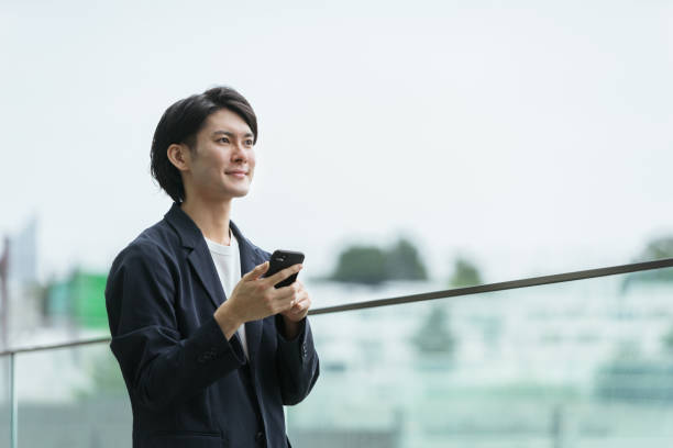 istock Image of men with smartphones and IoT 1394154606
