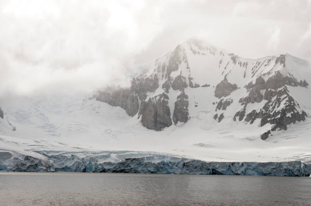 istock Coastline of Antarctica - Global Warming - Ice Formations 1394154660